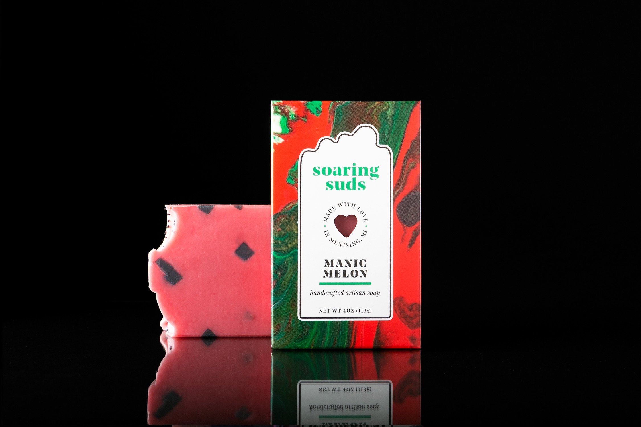Manic Melon Artisan Soap bar with a vibrant watermelon scent, handcrafted with natural ingredients including coconut milk.