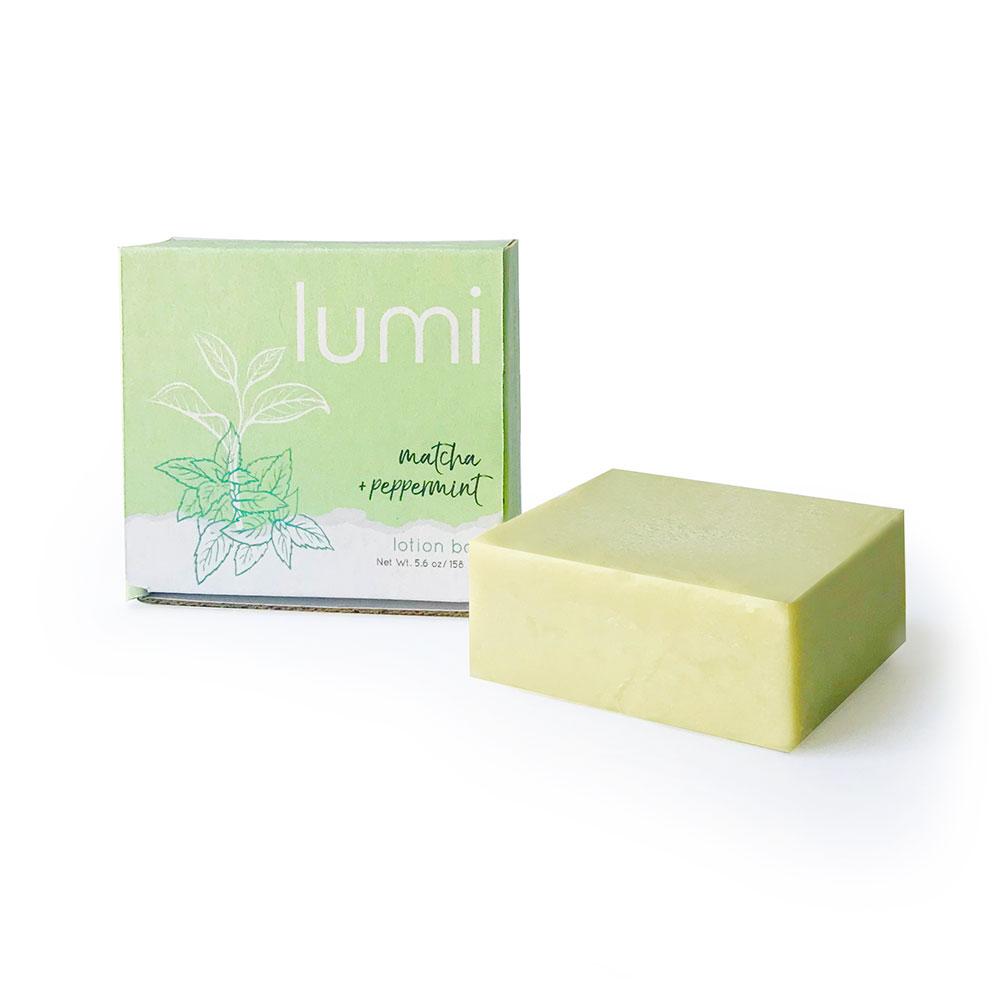 Matcha + Peppermint Lotion Bar in eco-friendly packaging, showcasing its solid form and vibrant green color.