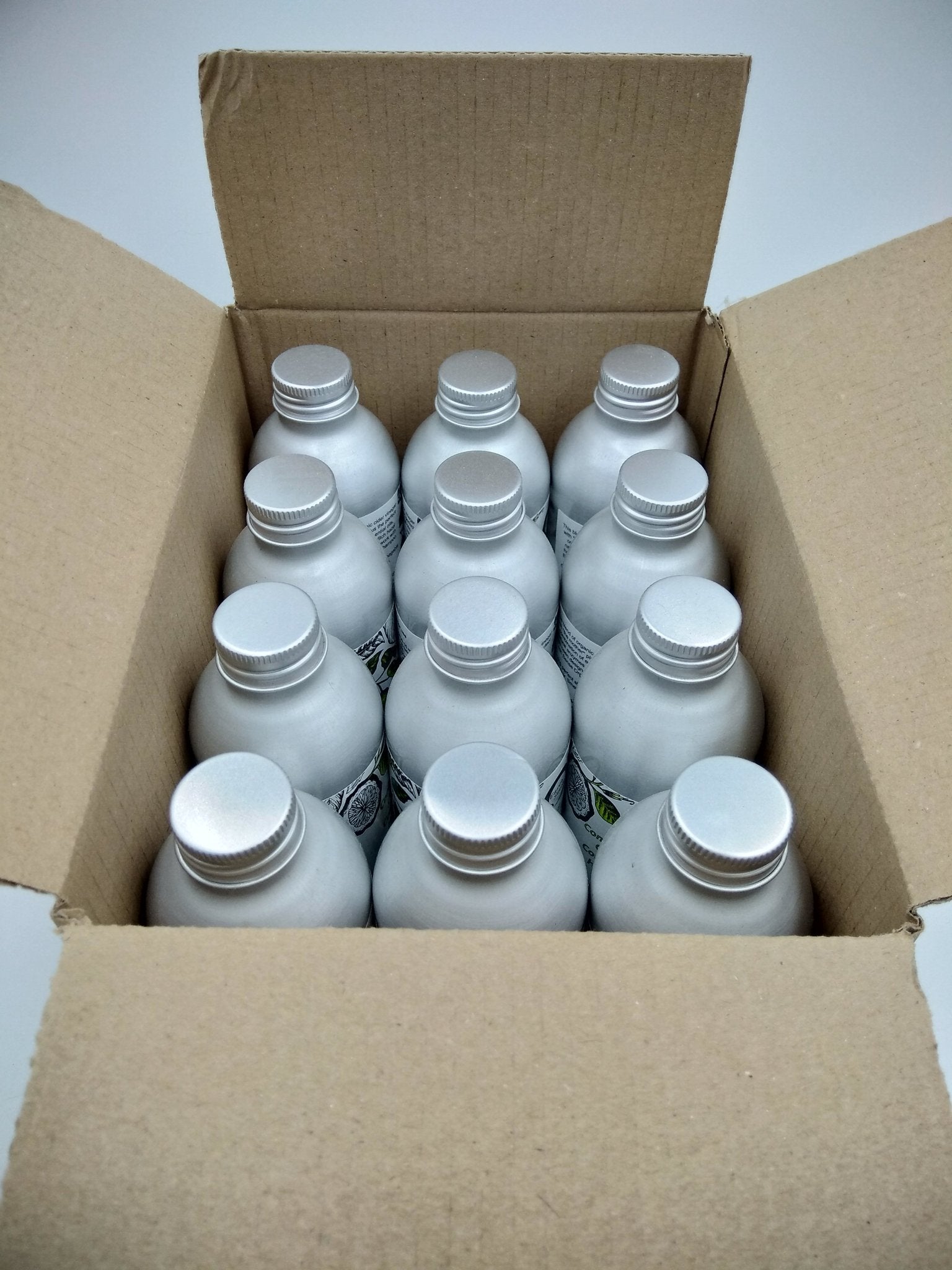MEGA BUNDLE of 12 x 200ml Concentrated Organic Conditioning Hair Rinse bottles, featuring essential oils for dry hair care.
