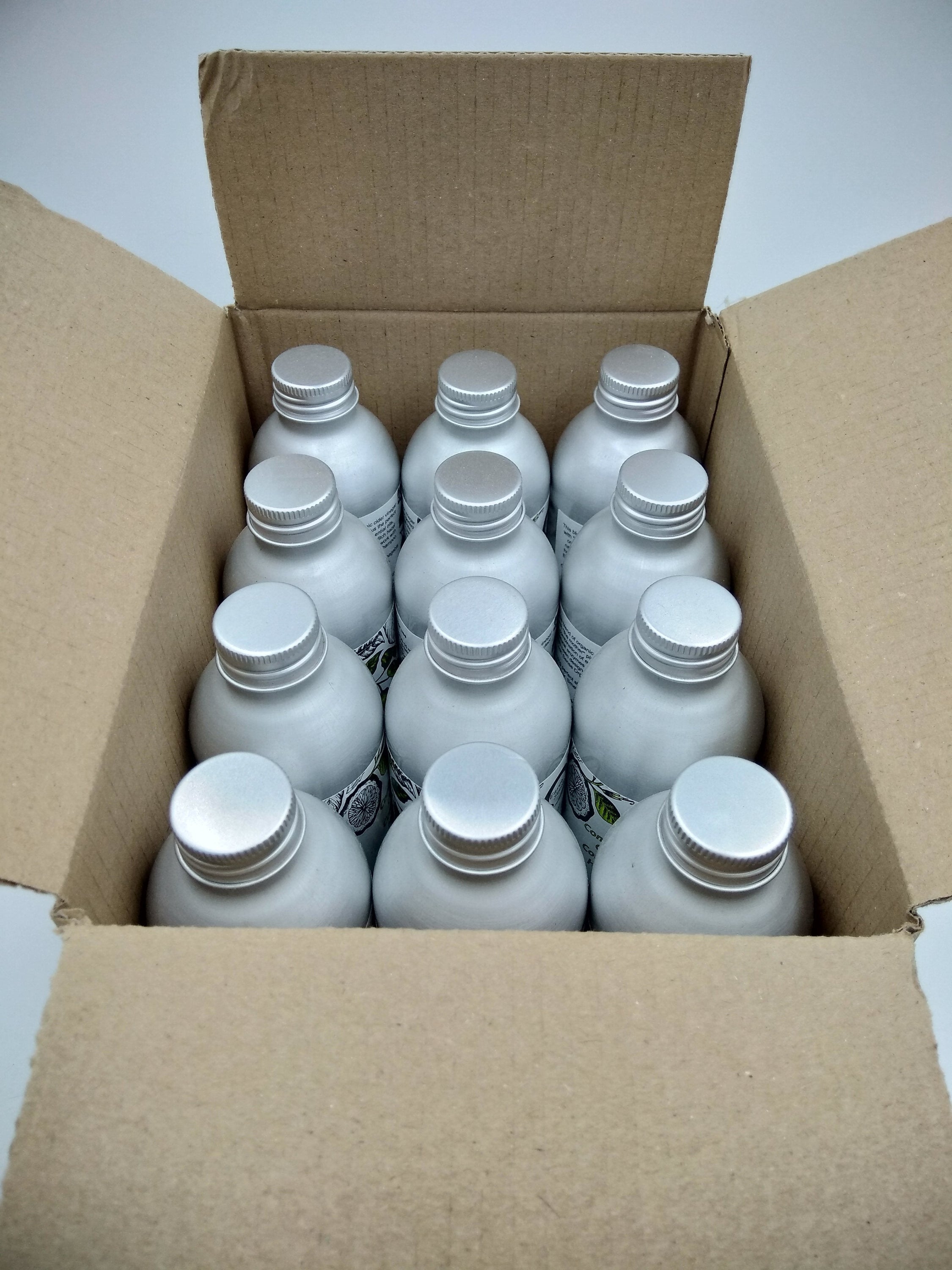 MEGA BUNDLE of 12 x 200ml Concentrated Organic Conditioning Hair Rinse bottles, featuring essential oils for dry hair care.