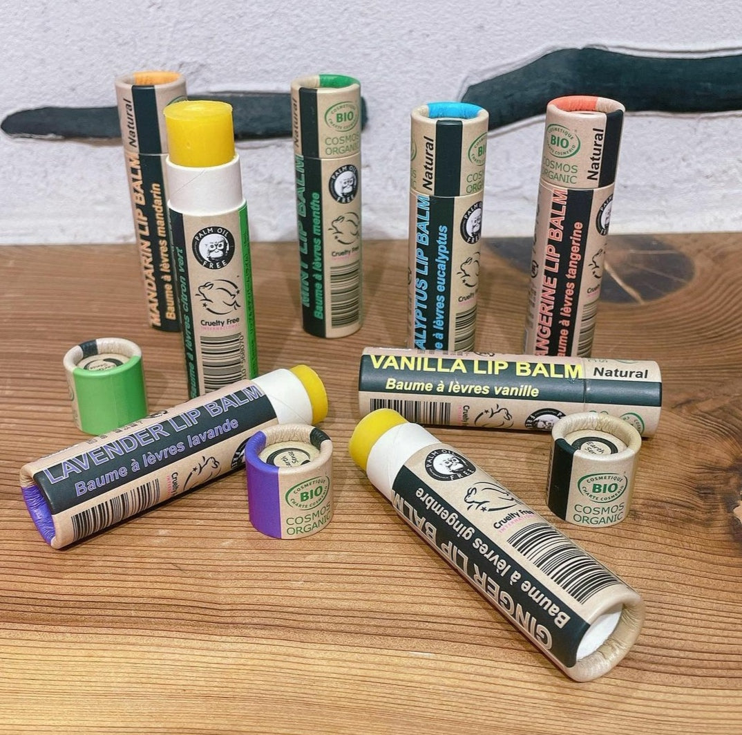 A collection of 30 x 15ml Organic Eucalyptus Lip Balms in eco-friendly packaging, showcasing their natural ingredients and refreshing scent.