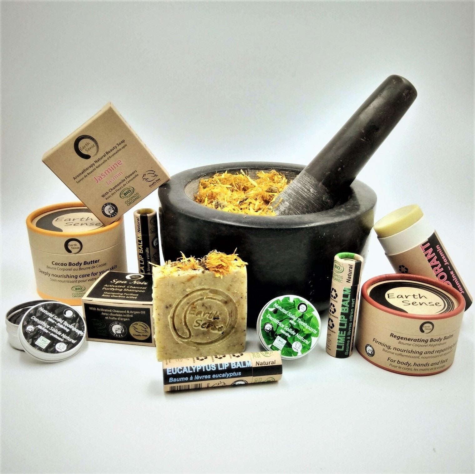 A collection of 54 organic certified solid soaps, each 90g, showcasing various types with eco-friendly packaging.