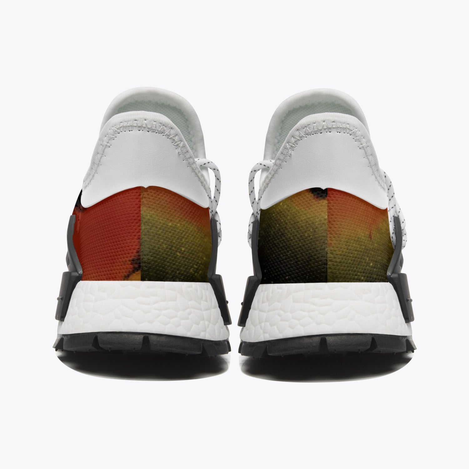 A pair of unisex Mesh Sports Sneakers - The Sun featuring breathable mesh fabric and a stylish black sole.