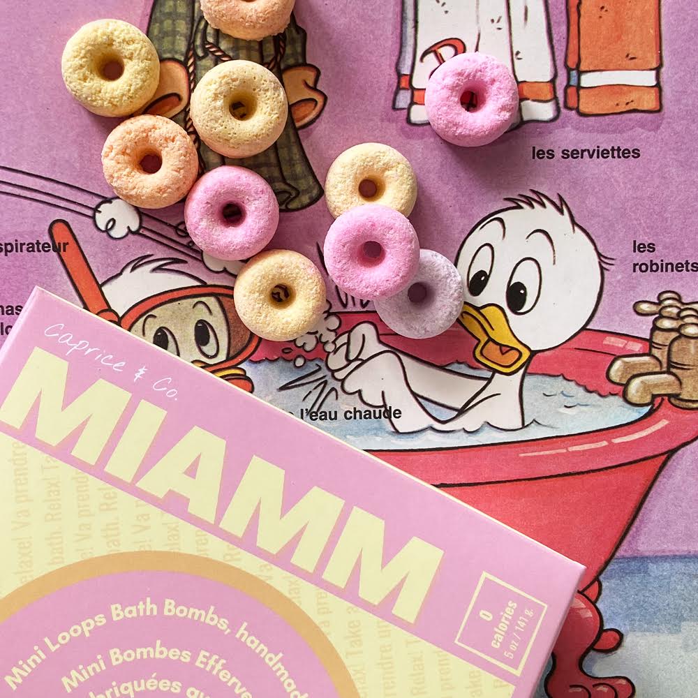 Miamm Mini Bath Bombs in vibrant colors, showcasing their handmade quality and sweet citrus cereal scent.