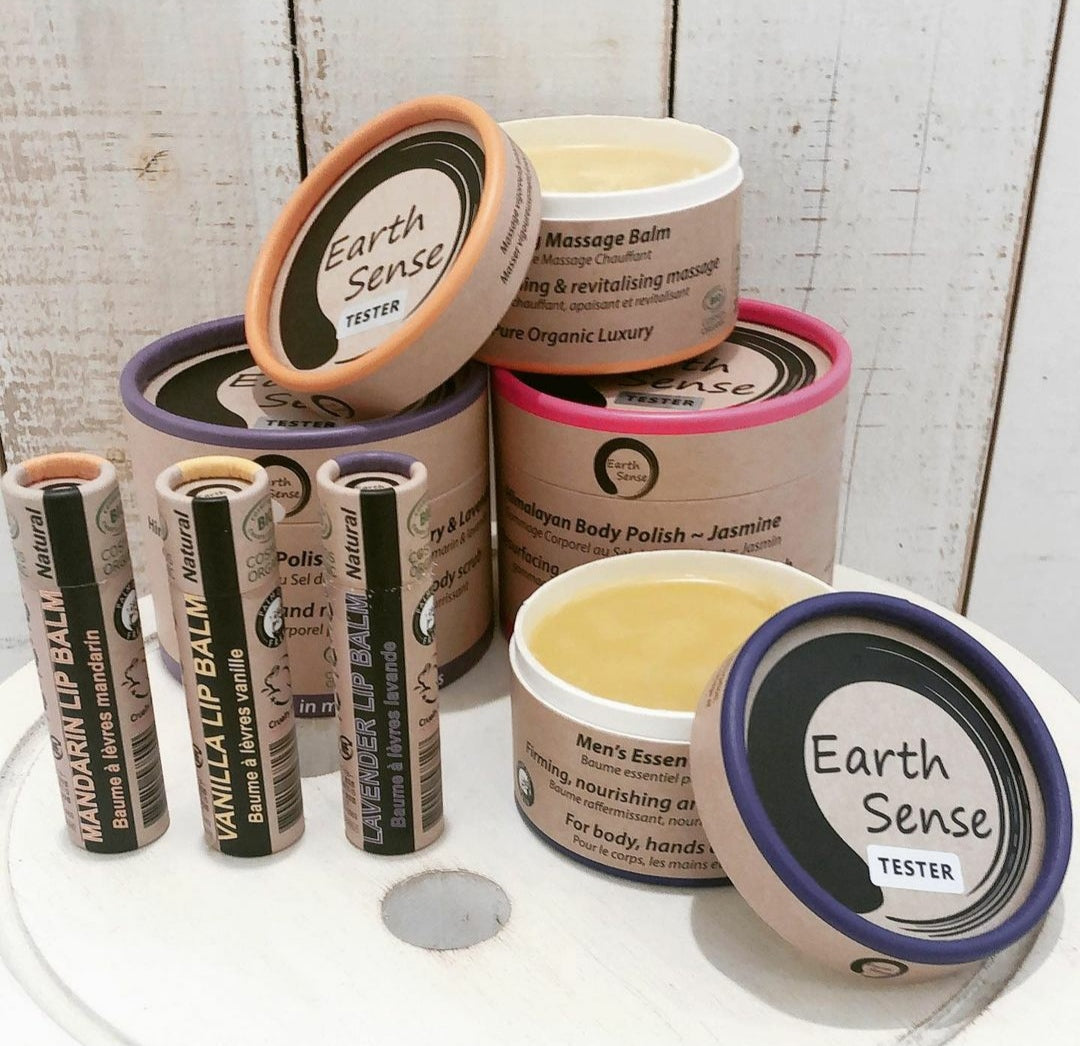 Two jars of 200ml Organic Certified Body Polish Exfoliants in Jasmine and Lavender & Rosemary scents, showcasing eco-friendly packaging.