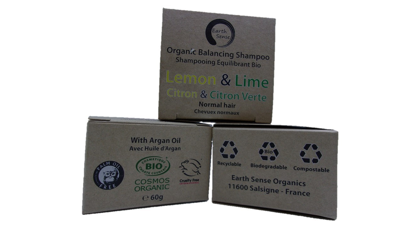 Four 60g bars of organic solid shampoo in lemon and lime scent, packaged together in a mini bundle.
