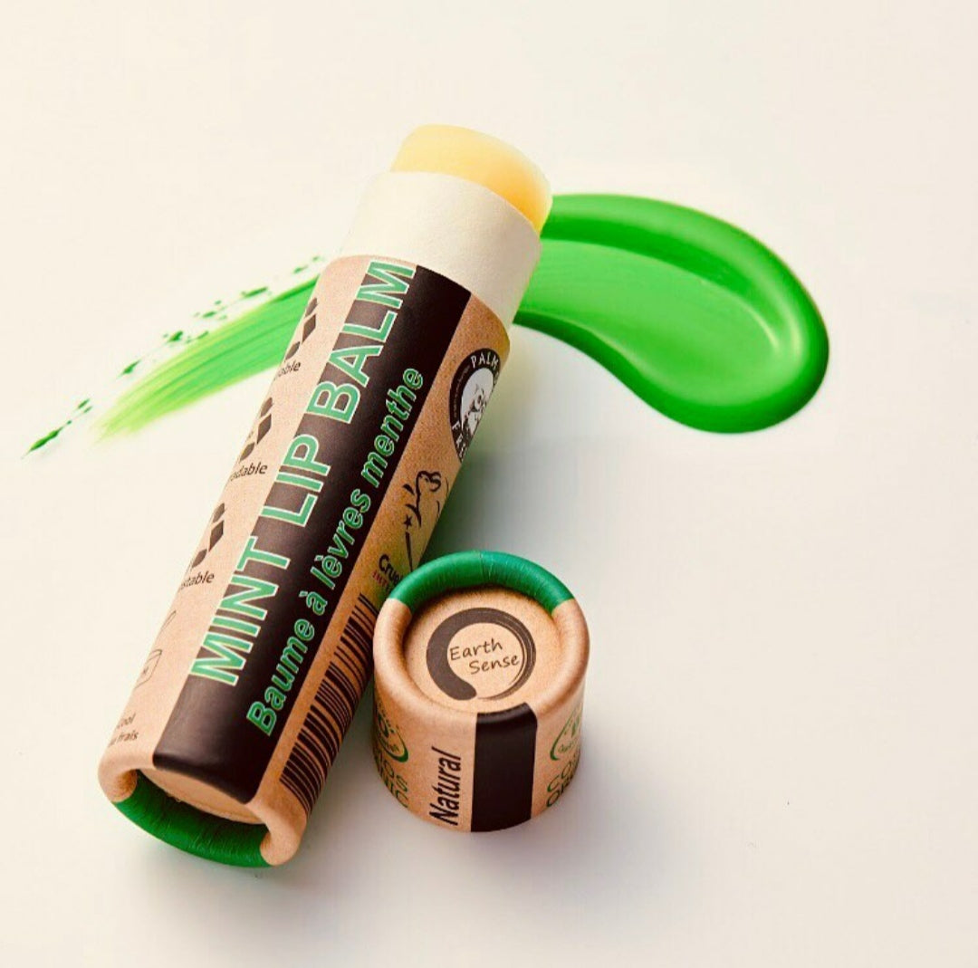 Four 15ml tubes of Organic Peppermint Lip Balm in eco-friendly packaging, showcasing their natural ingredients.