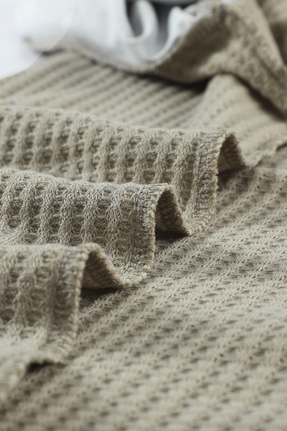 Mocha Leopard Print Waffle Knit Long Sleeve Top featuring a split neck and full-length sleeves with a stylish leopard print design.