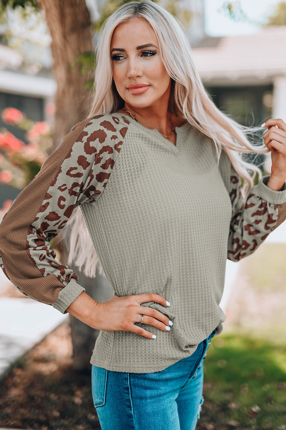 Mocha Leopard Print Waffle Knit Long Sleeve Top featuring a split neck and full-length sleeves with a stylish leopard print design.