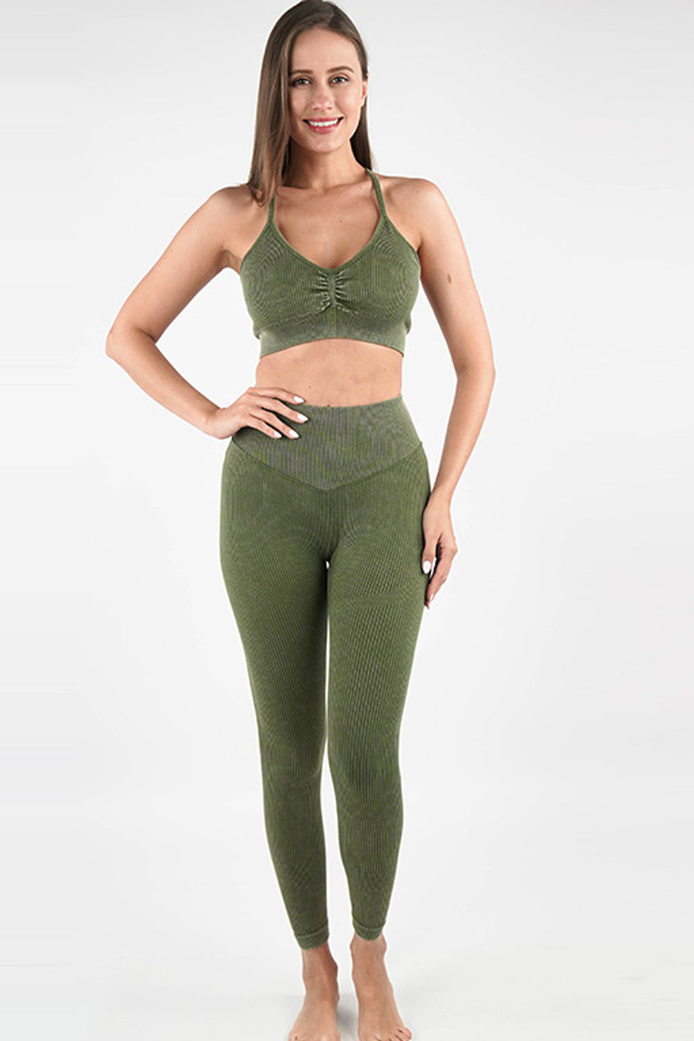 Moss Green Seamless Ribbed Spaghetti Straps Bra Leggings Sports Set showcasing a stylish and comfortable design, perfect for workouts.