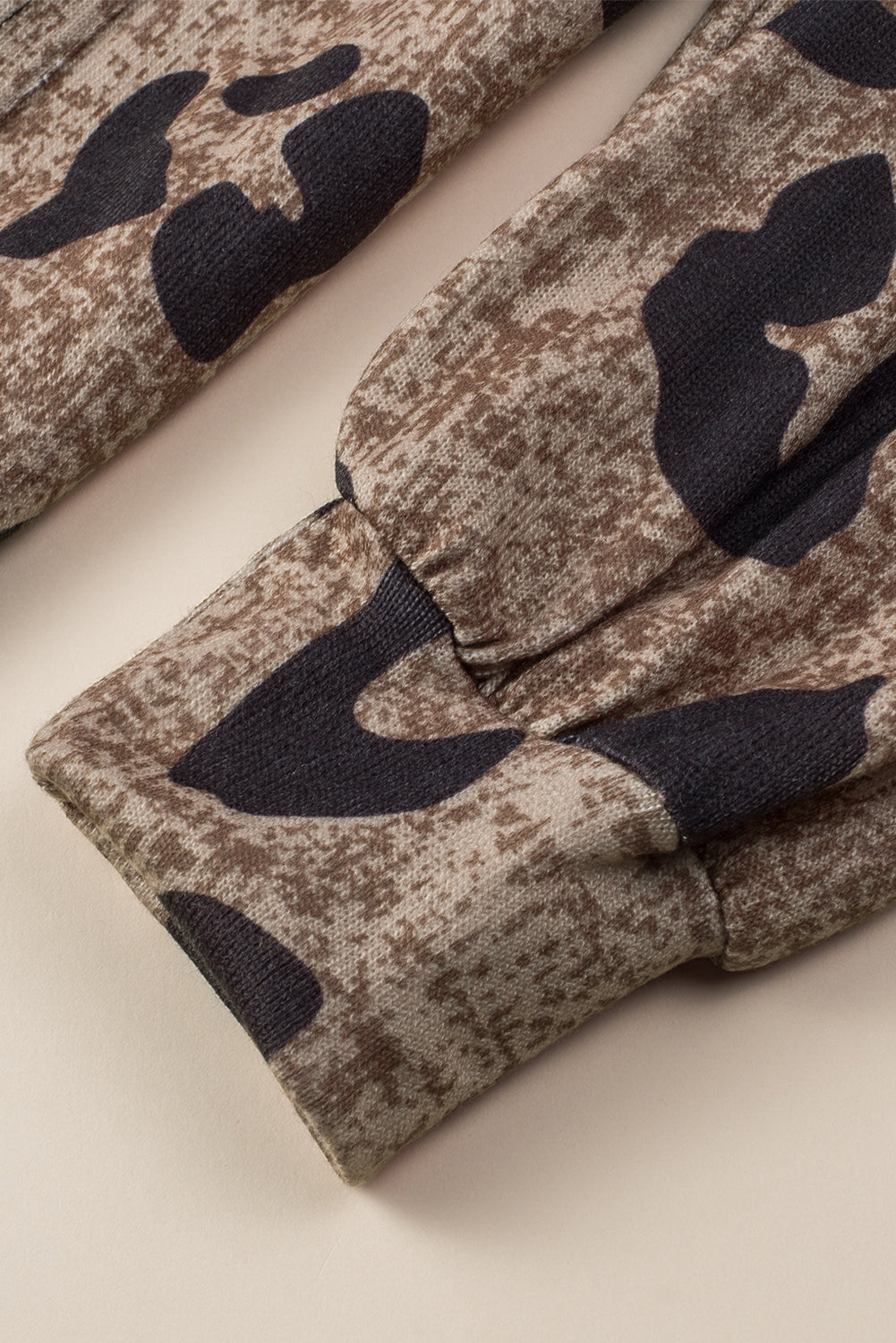 Multicolor Contrast V Neck Drop Shoulder Leopard Top featuring a trendy leopard print and stylish color block design.