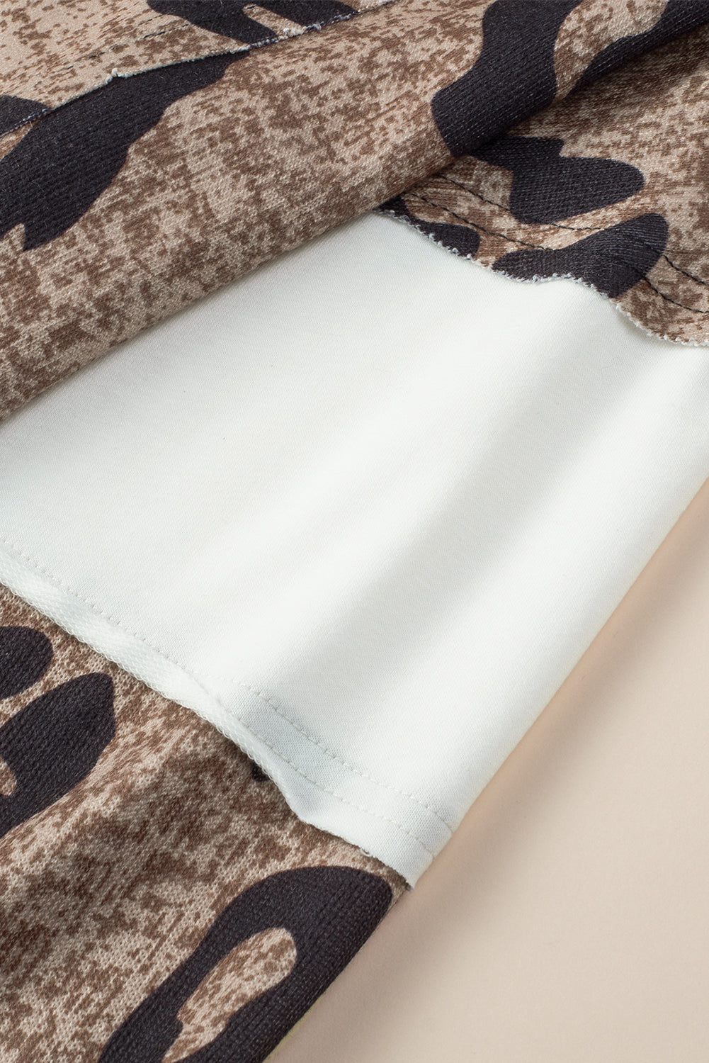 Multicolor Contrast V Neck Drop Shoulder Leopard Top featuring a trendy leopard print and stylish color block design.