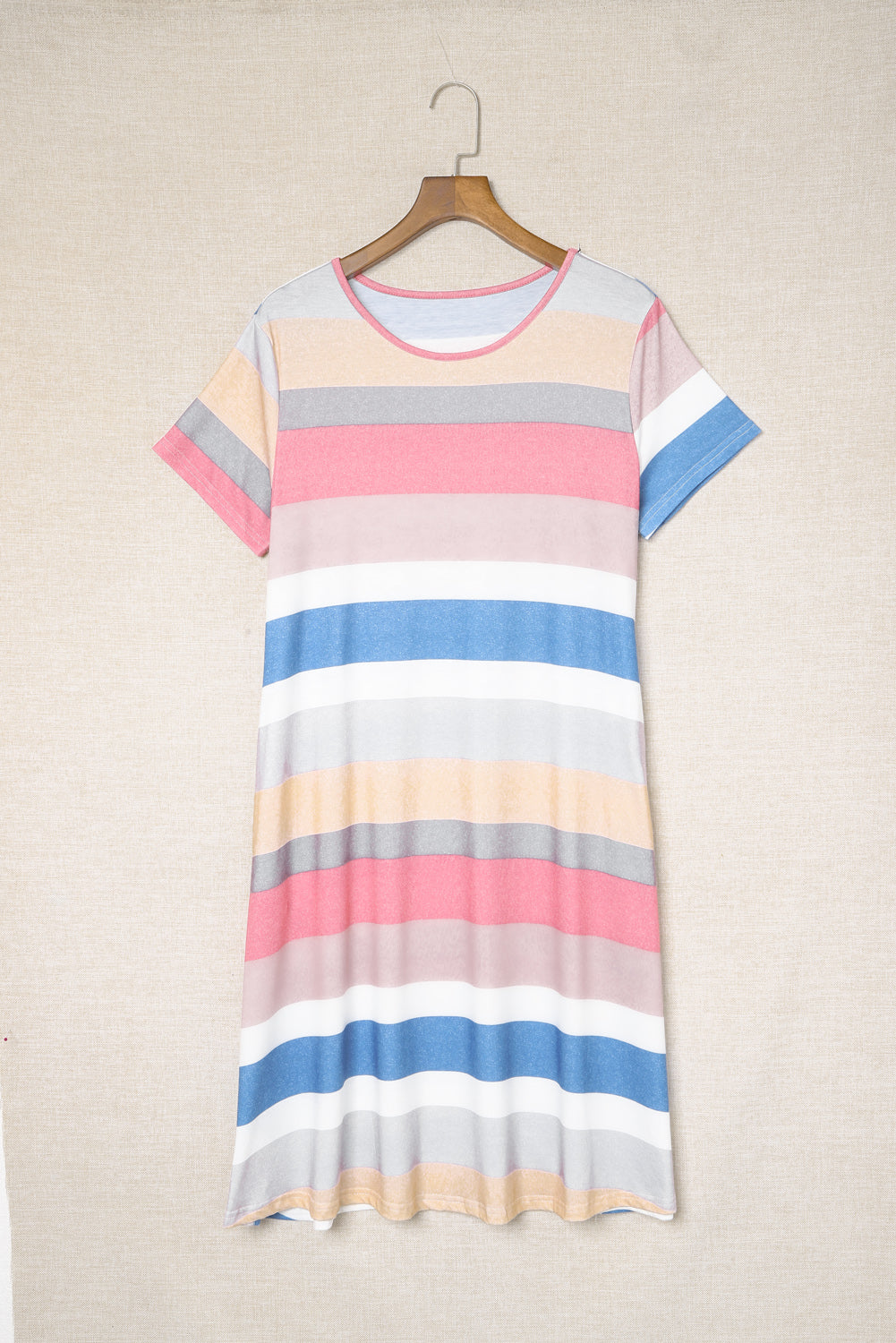 A stylish multicolor striped pocket t-shirt dress, featuring short sleeves and a relaxed fit, perfect for casual outings.