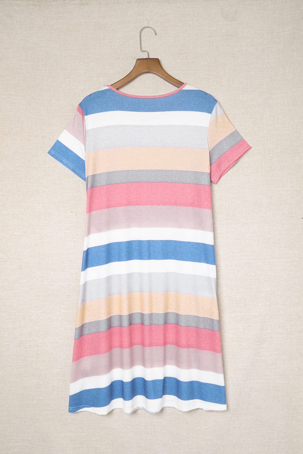 A stylish multicolor striped pocket t-shirt dress, featuring short sleeves and a relaxed fit, perfect for casual outings.