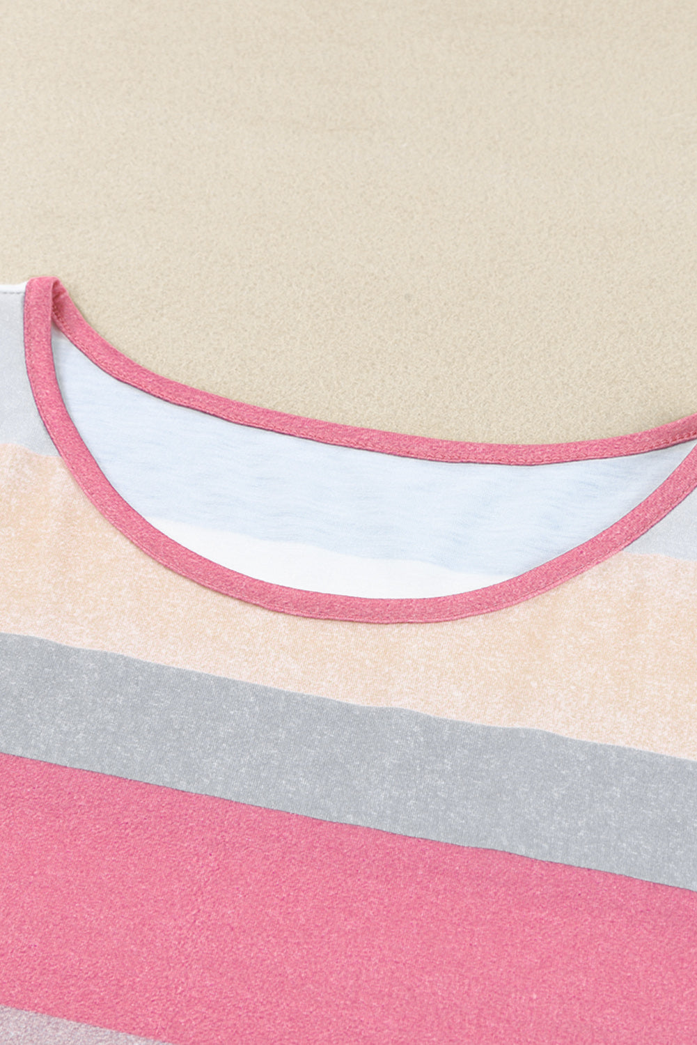 A stylish multicolor striped pocket t-shirt dress, featuring short sleeves and a relaxed fit, perfect for casual outings.