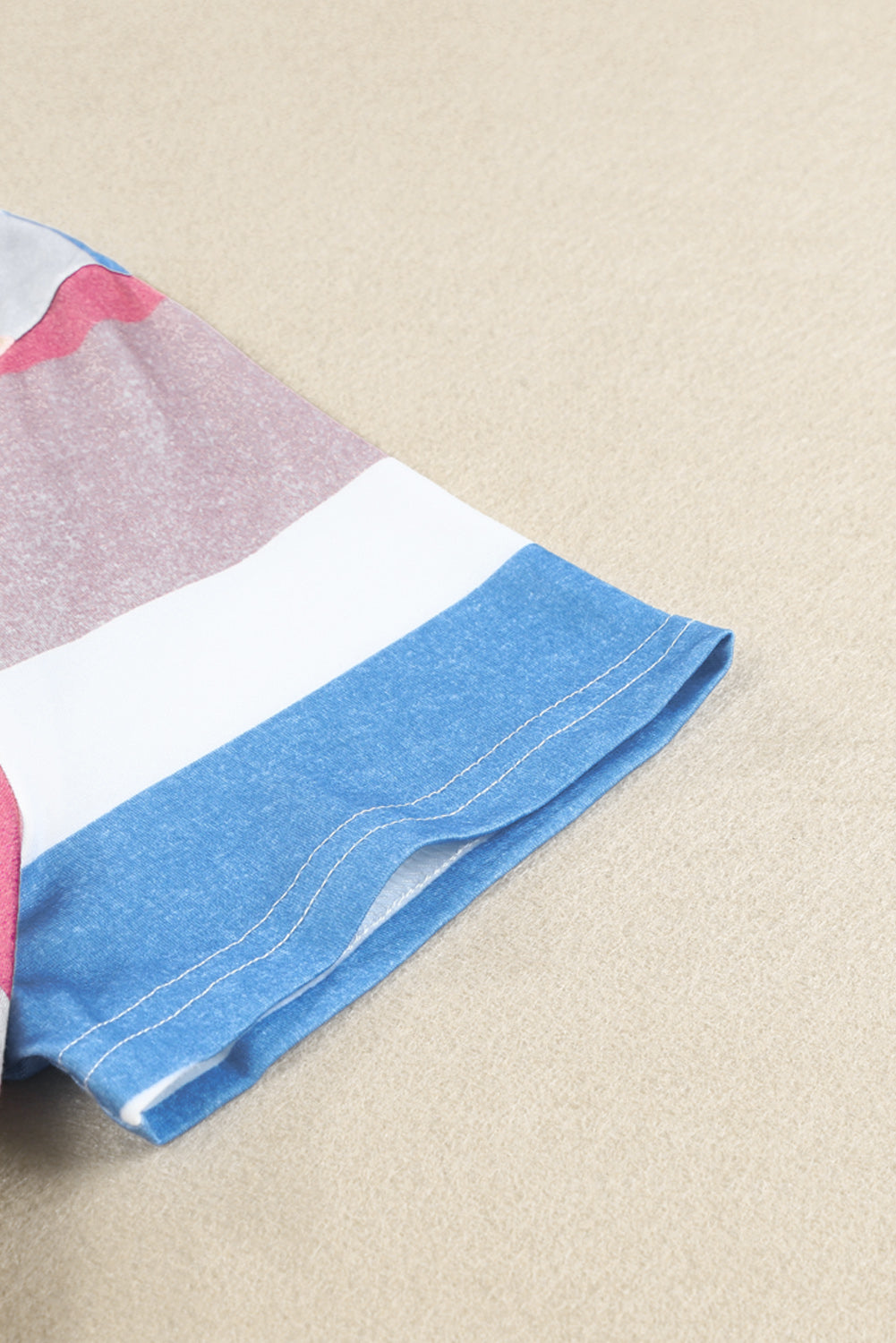 A stylish multicolor striped pocket t-shirt dress, featuring short sleeves and a relaxed fit, perfect for casual outings.