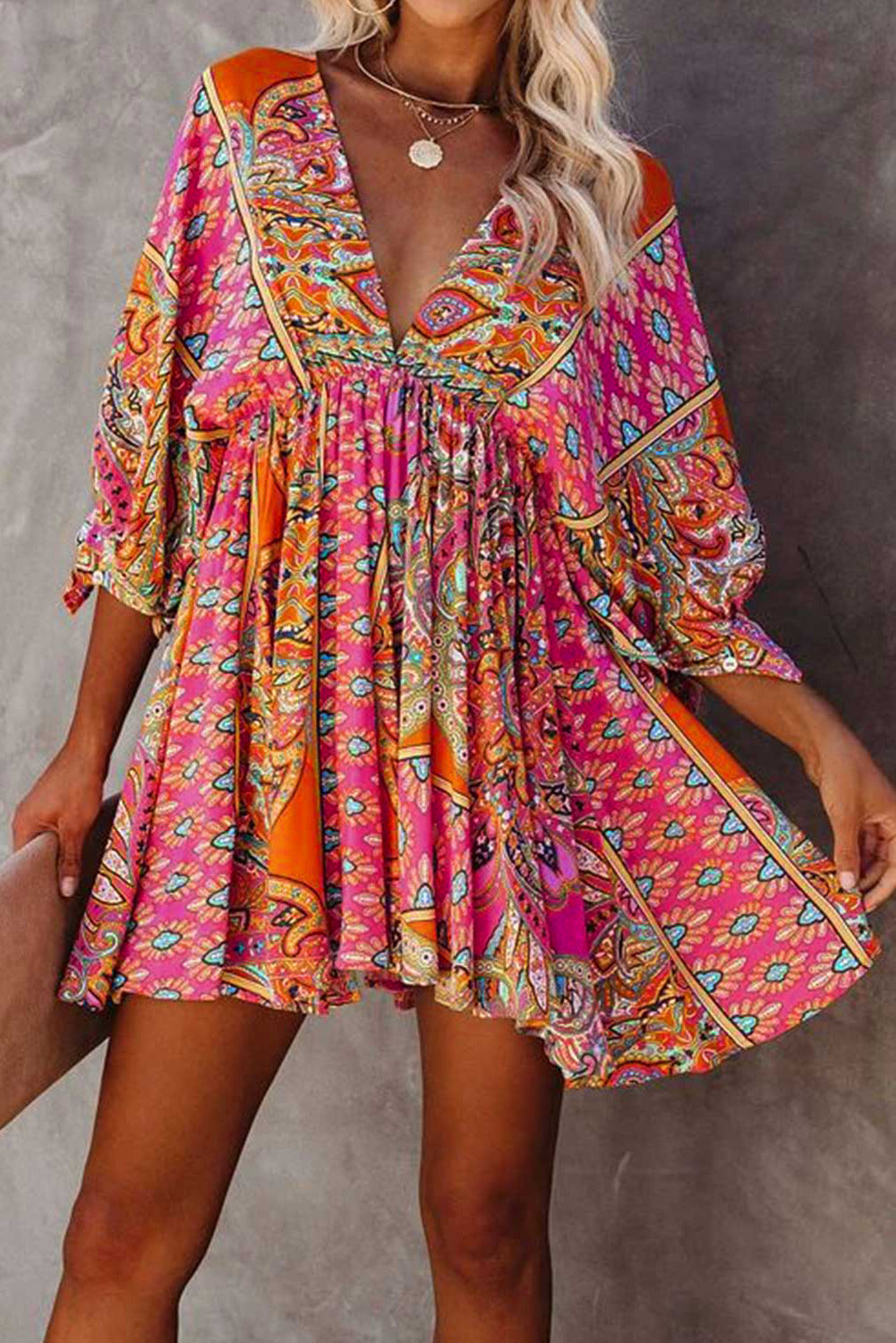 Multicolour V Neck 3/4 Sleeve Bohemian Vintage Print Mini Dress showcasing elegant open-back design and vibrant bohemian print.