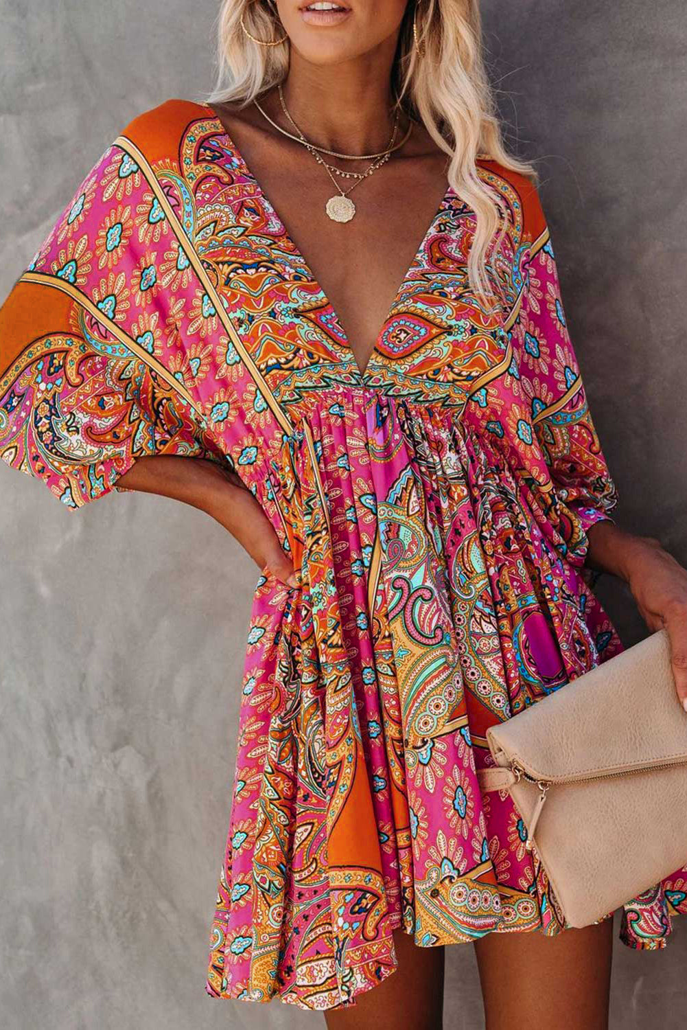 Multicolour V Neck 3/4 Sleeve Bohemian Vintage Print Mini Dress showcasing elegant open-back design and vibrant bohemian print.
