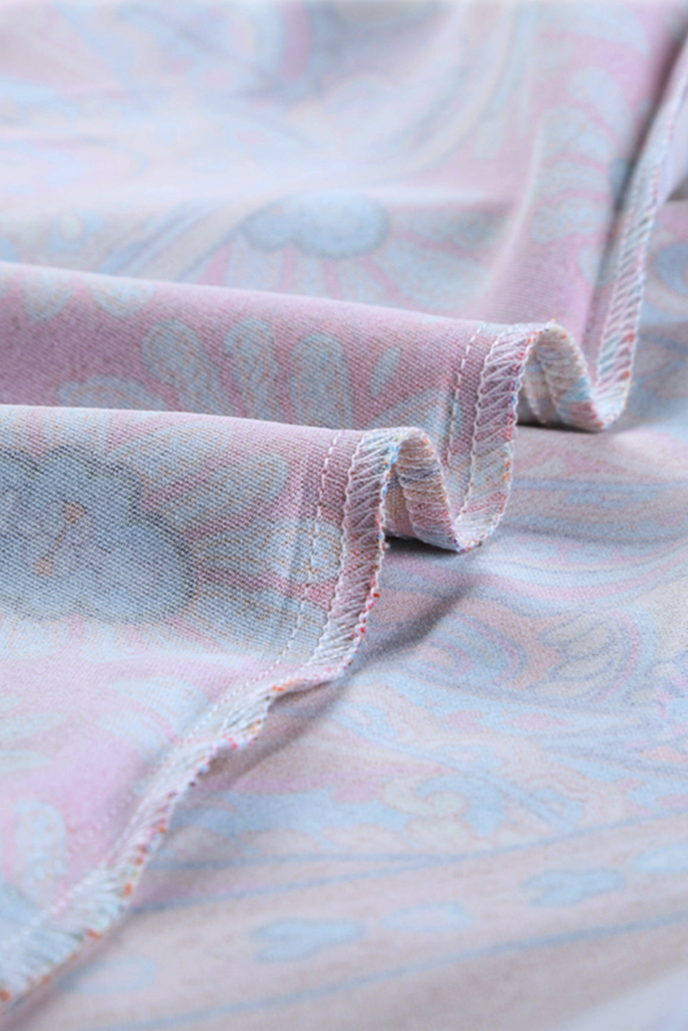 Multicolour V Neck 3/4 Sleeve Bohemian Vintage Print Mini Dress showcasing elegant open-back design and vibrant bohemian print.