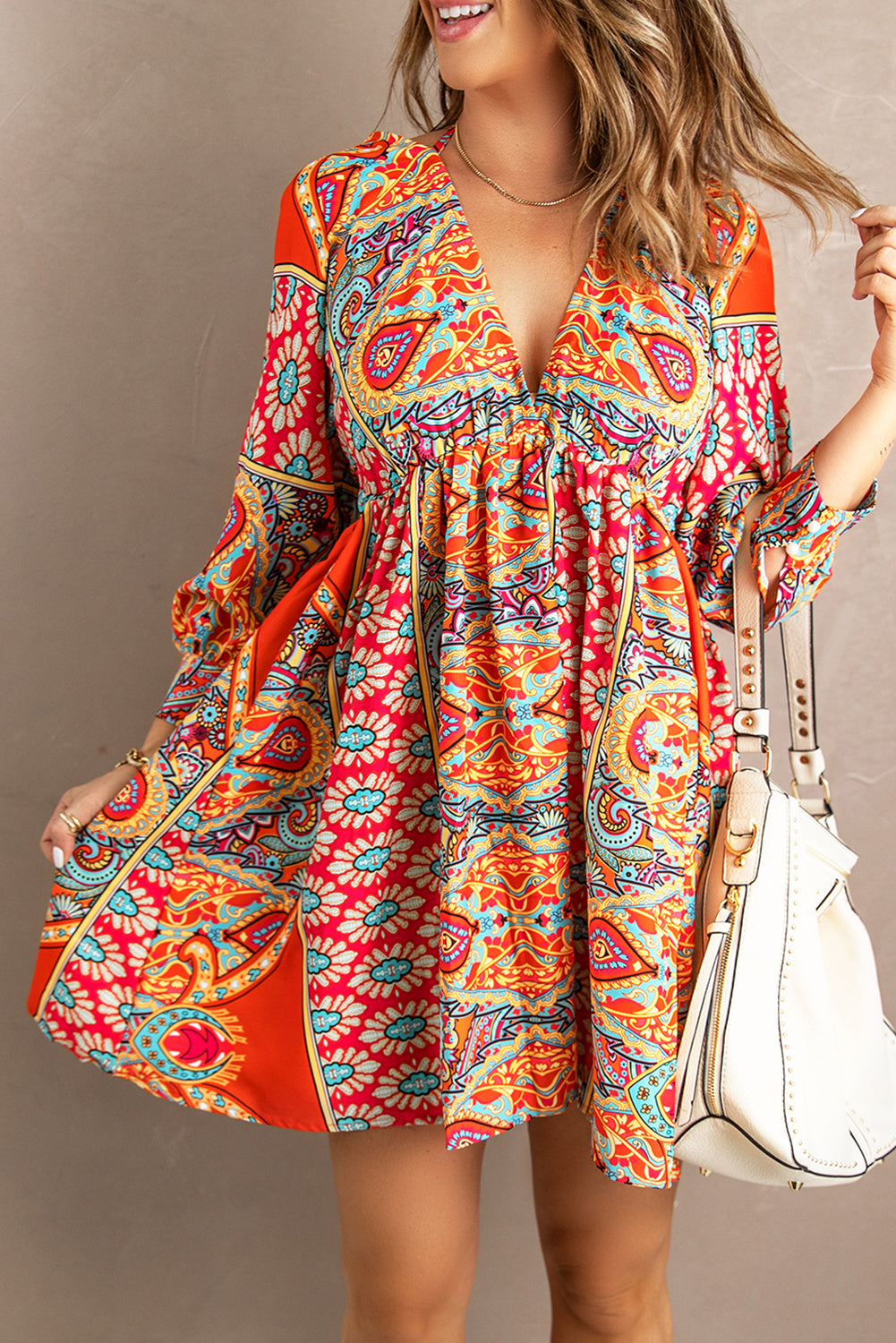 Multicolour V Neck 3/4 Sleeve Bohemian Vintage Print Mini Dress showcasing elegant open-back design and vibrant bohemian print.