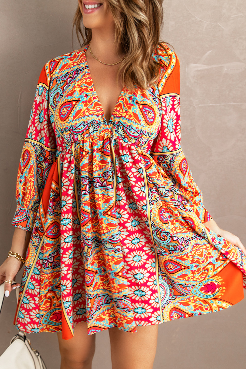 Multicolour V Neck 3/4 Sleeve Bohemian Vintage Print Mini Dress showcasing elegant open-back design and vibrant bohemian print.