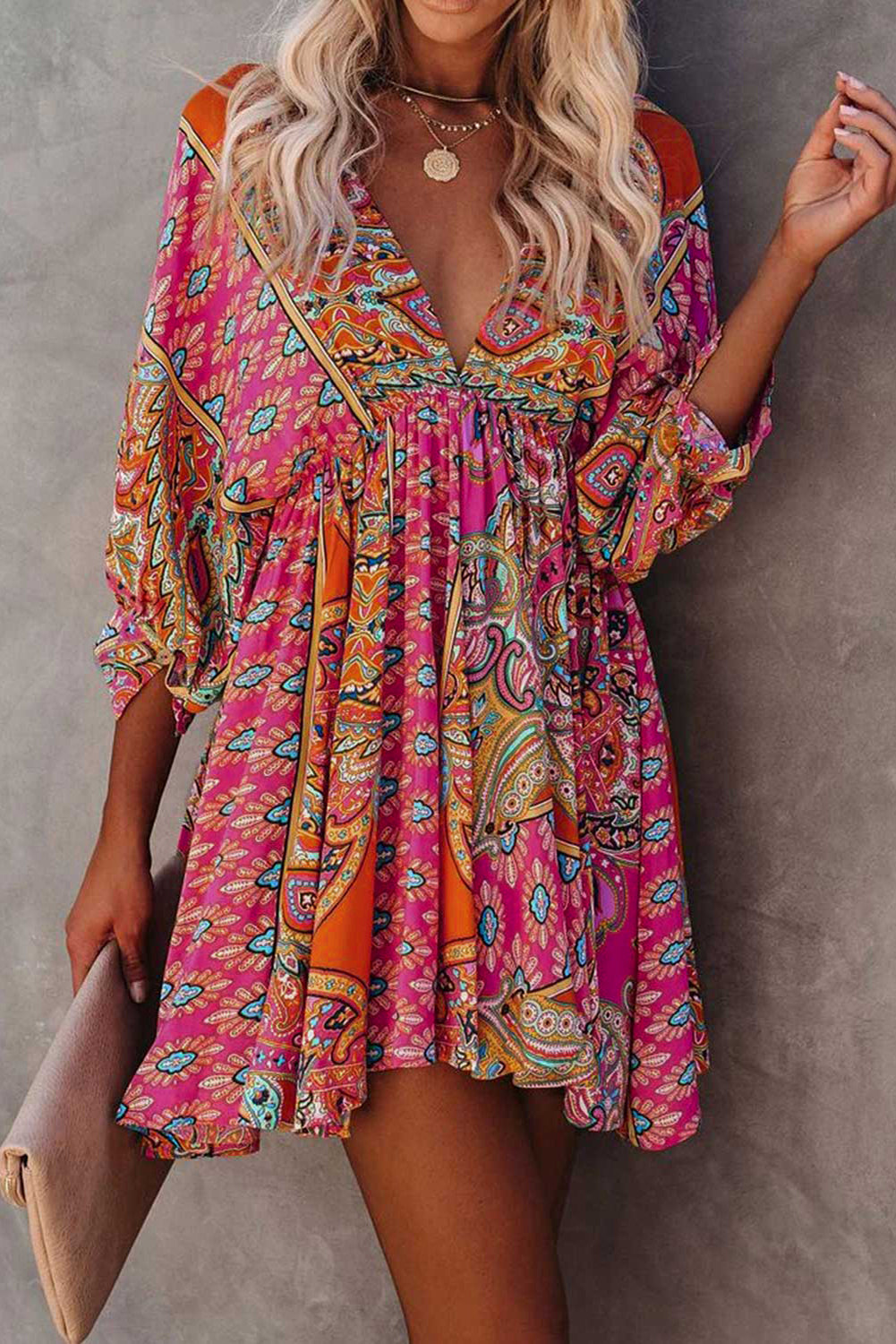 Multicolour V Neck 3/4 Sleeve Bohemian Vintage Print Mini Dress showcasing elegant open-back design and vibrant bohemian print.