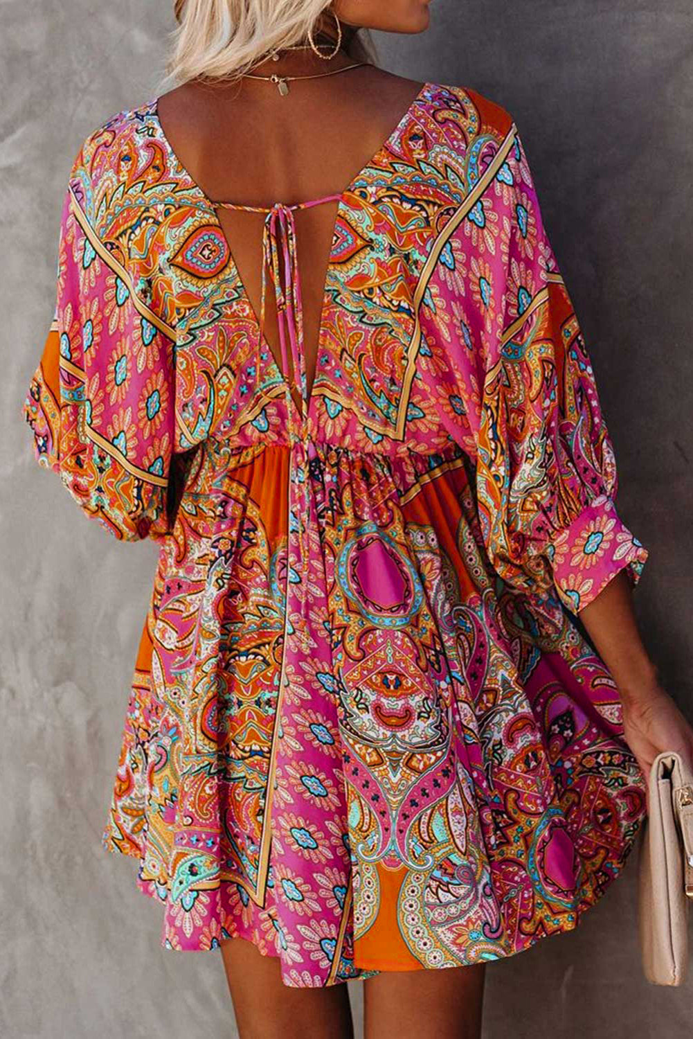 Multicolour V Neck 3/4 Sleeve Bohemian Vintage Print Mini Dress showcasing elegant open-back design and vibrant bohemian print.