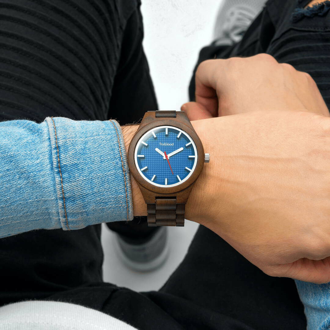TruWood Navigator Wrist Watch featuring a black sandalwood case and blue square pattern dial, showcasing its elegant design.