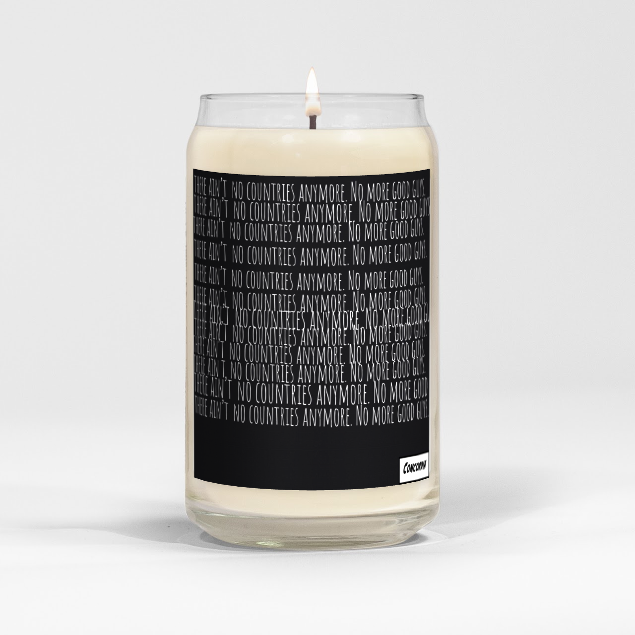 A beautifully crafted 'No More Countries' candle in a clear vessel, showcasing its natural soy wax and elegant label.