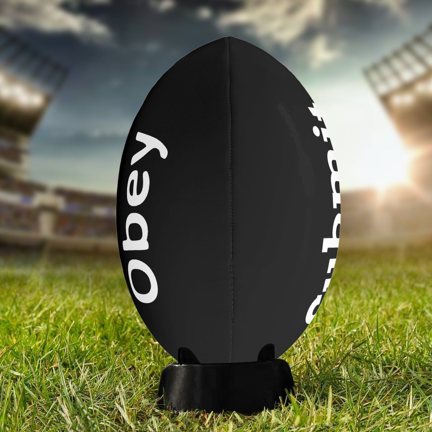 Obey and Submit Rugby Ball featuring a reflective PVC surface and delicate all-over printing design, ideal for training and games.