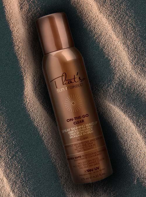 On-The-Go Clear tanning spray by That’s So Sun Make-Up, featuring a sleek bottle design with a transparent liquid inside, ideal for achieving a natural tan.