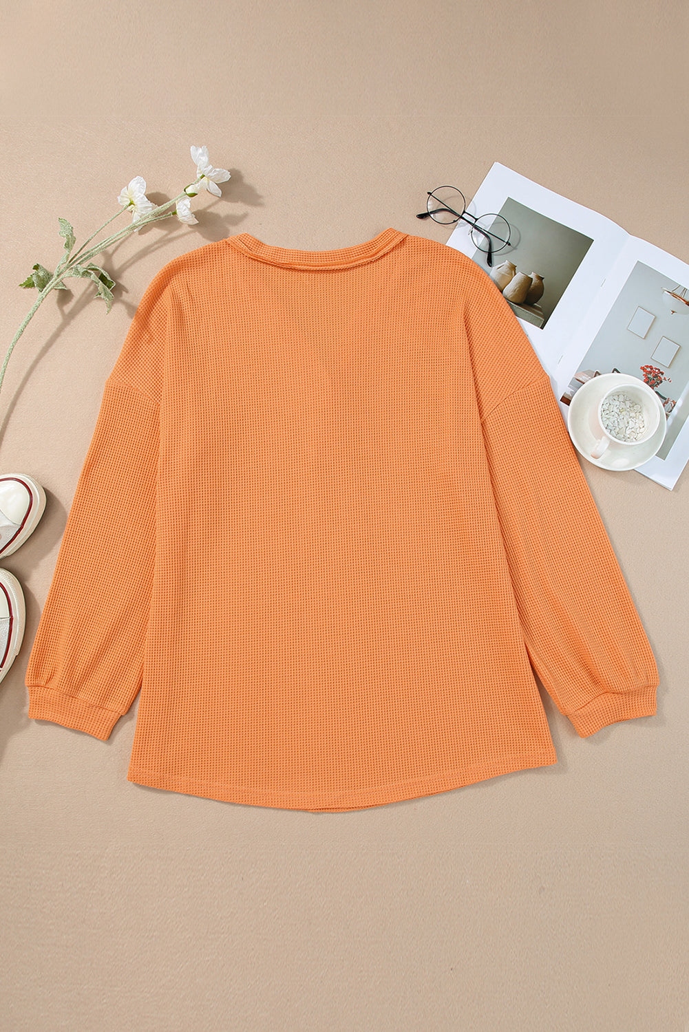 Orange Buttoned V Neck Waffle Knit Plus Size Top featuring a stylish waffle knit texture and buttoned neckline.