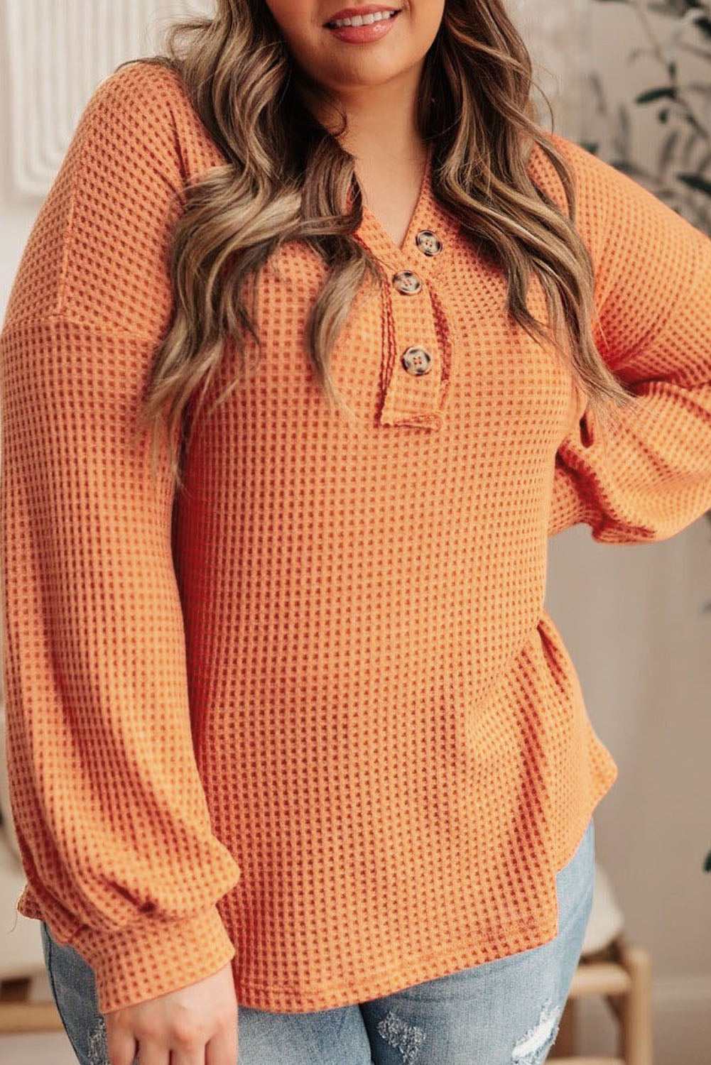 Orange Buttoned V Neck Waffle Knit Plus Size Top featuring a stylish waffle knit texture and buttoned neckline.