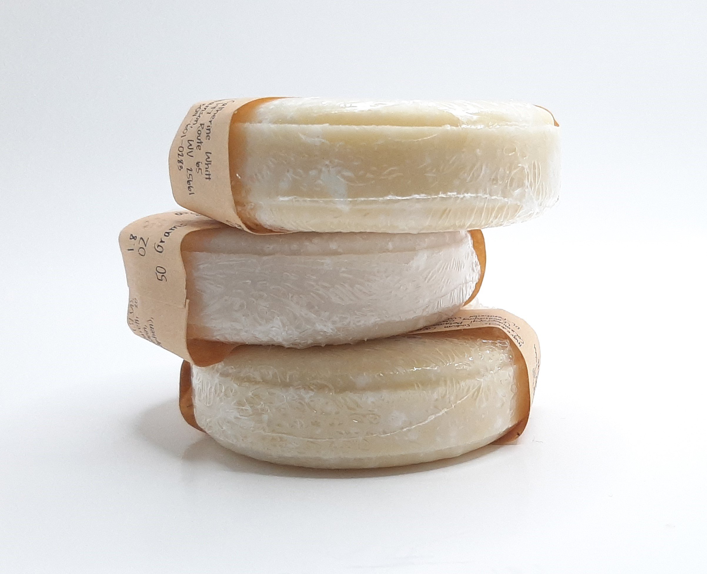 Orange Clove Shampoo Bar with sweet orange and clove essential oils, eco-friendly and handcrafted for silky smooth hair.