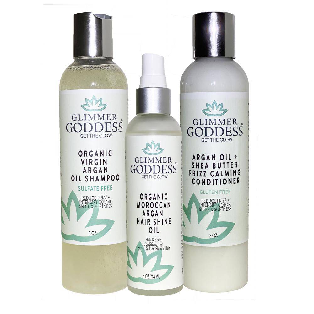 Organic Argan Oil Trio including shampoo, conditioner, and hair shine spray, designed for silky and shiny hair.