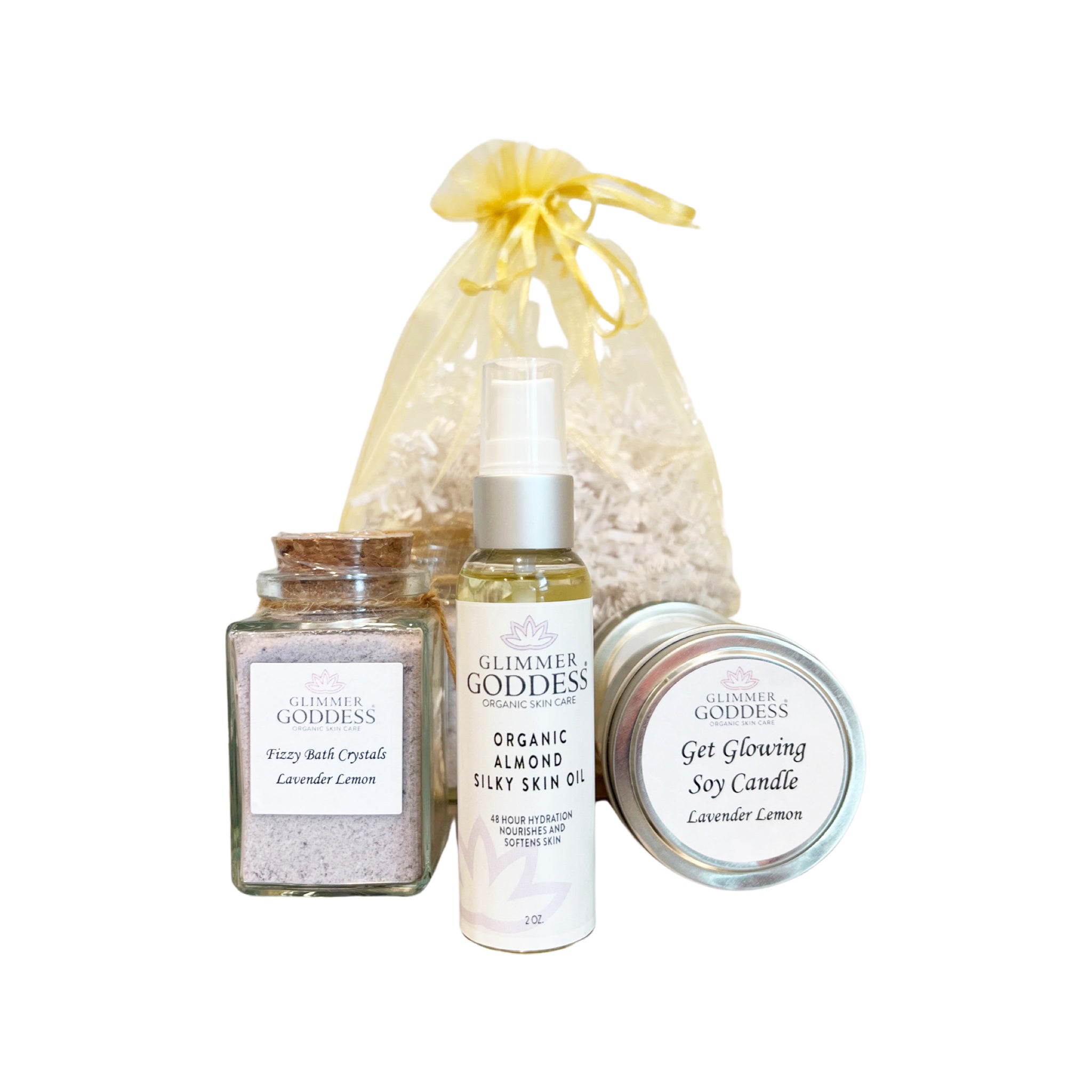 Organic Bath & Body Gift Set featuring Sweet Almond Shower Oil, Lavender Lemon Bath Salts, and Soy Candle in an elegant organza bag.