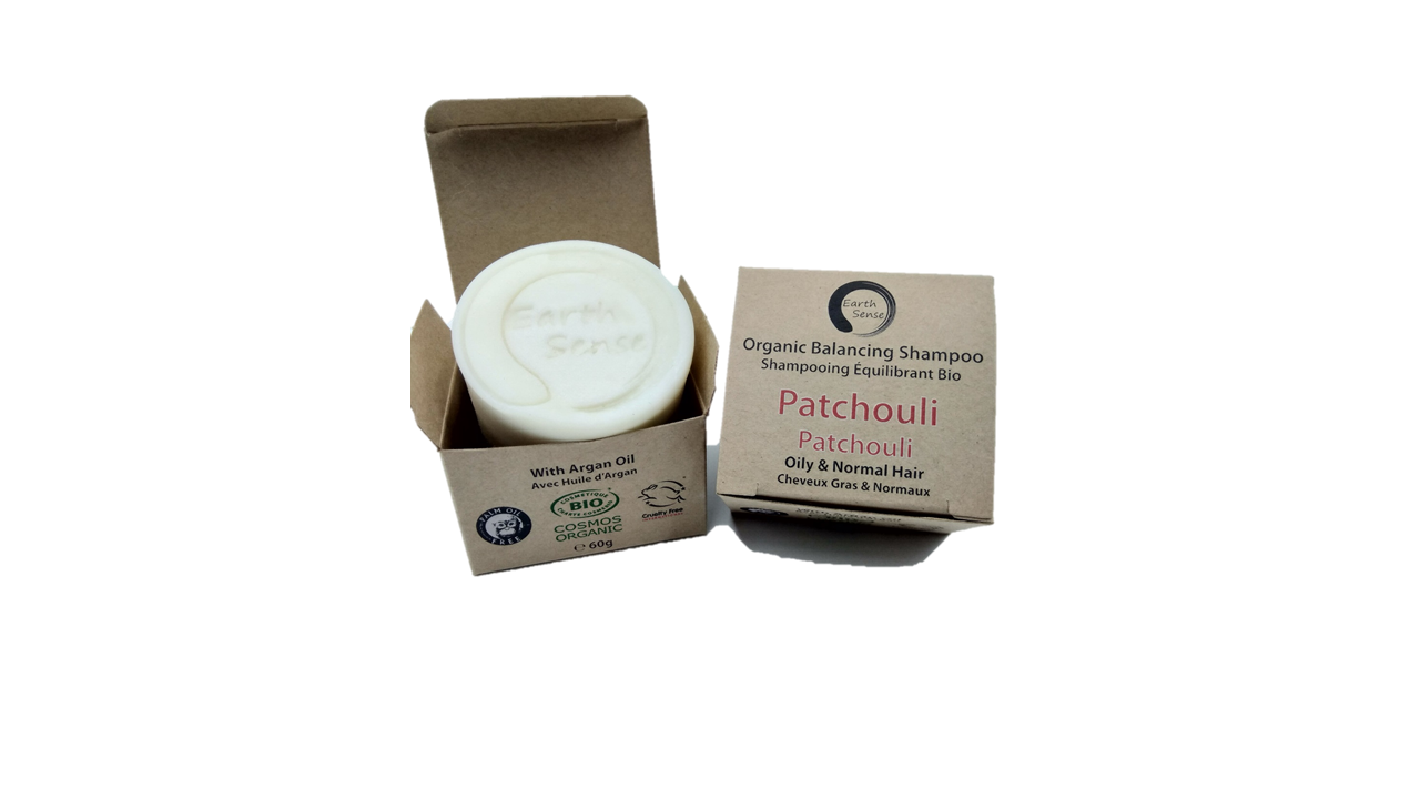 Organic Certified Balancing Solid Shampoo bar with Patchouli, ideal for oily and all hair types, showcasing its natural ingredients.