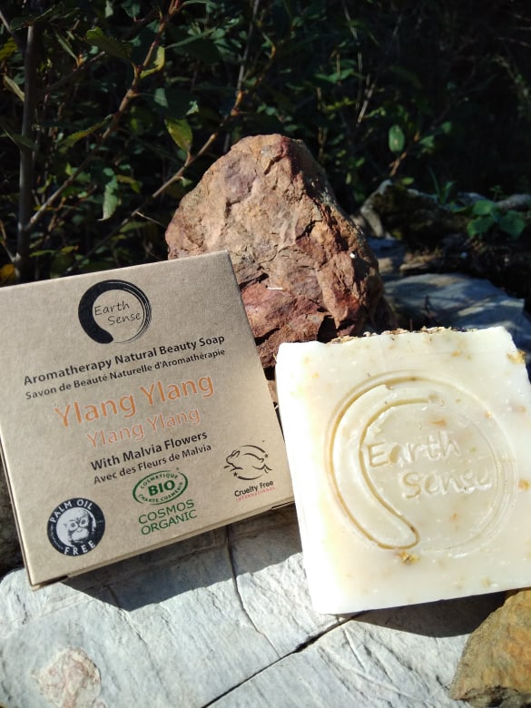 Organic Certified Solid Soap with Jasmine and Chamomile Flowers, showcasing its natural ingredients and elegant packaging.