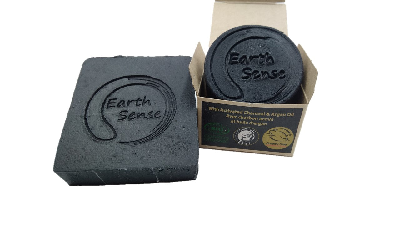 Organic Certified Spa Noir Solid Shampoo bar with activated charcoal, showcasing its rich texture and natural ingredients.