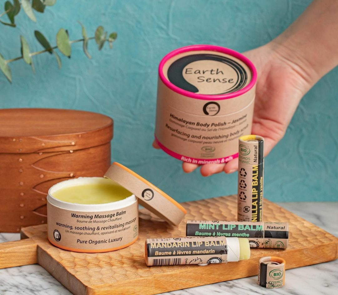 Organic Regenerating Body Balm with Ylang Ylang in a 100ml container, showcasing its natural ingredients and eco-friendly packaging.