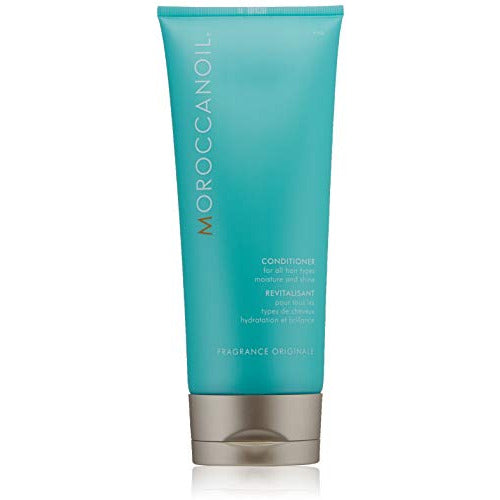 Moroccanoil Original Fragrance Moisture And Shine Conditioner bottle with a sleek design, showcasing its luxurious branding.