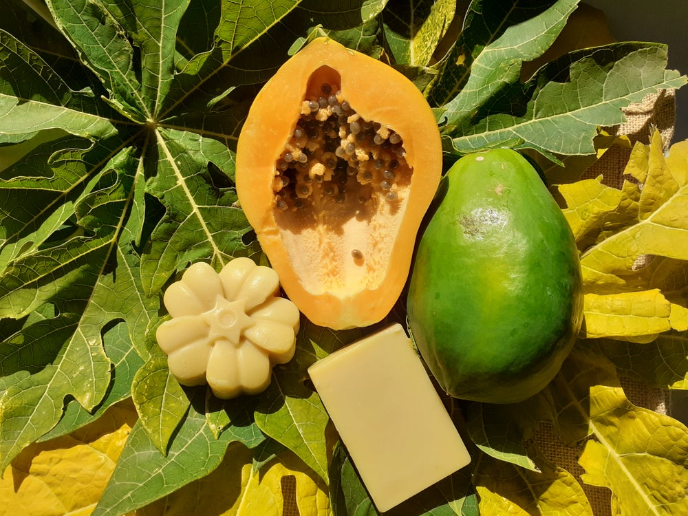 Handmade Papaya Bath Soap with natural ingredients, showcasing its creamy texture and vibrant color.