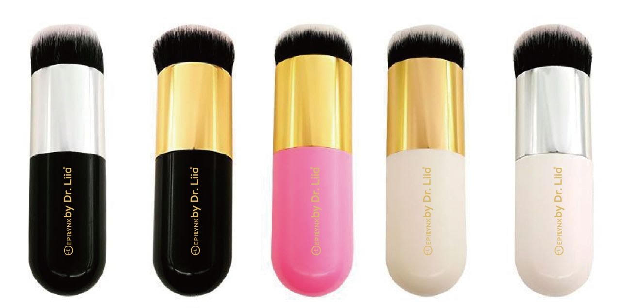 A set of Perfect Vegan Makeup Brushes in silver, pink, and gold, designed for flawless application of blush, highlighter, and foundation.