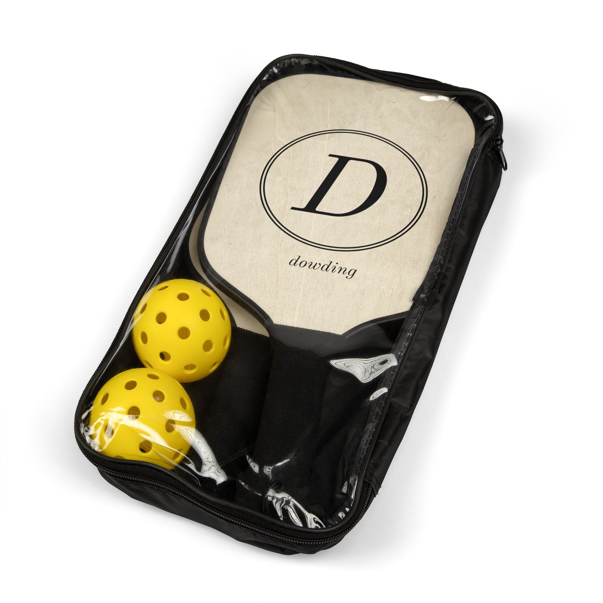 A complete pickleball kit featuring two wooden paddles and two plastic balls in a transparent carry bag.
