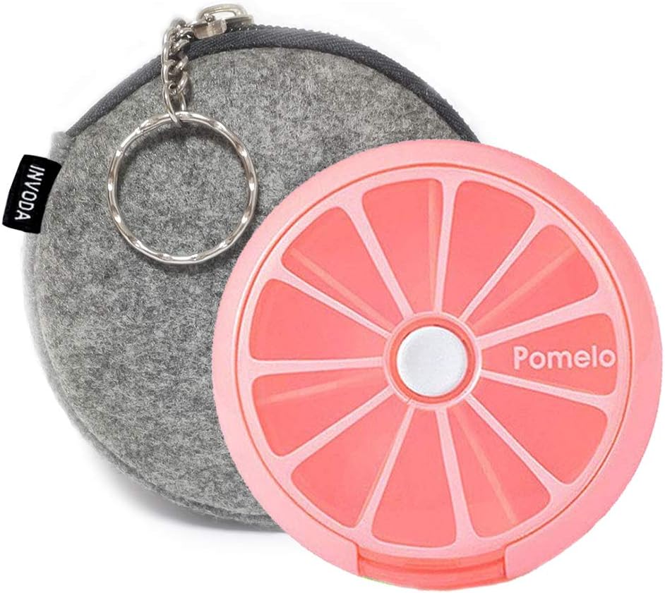 Large orange pill case with 7 compartments for organizing daily medications, featuring a waterproof design and easy-to-use rotating mechanism.