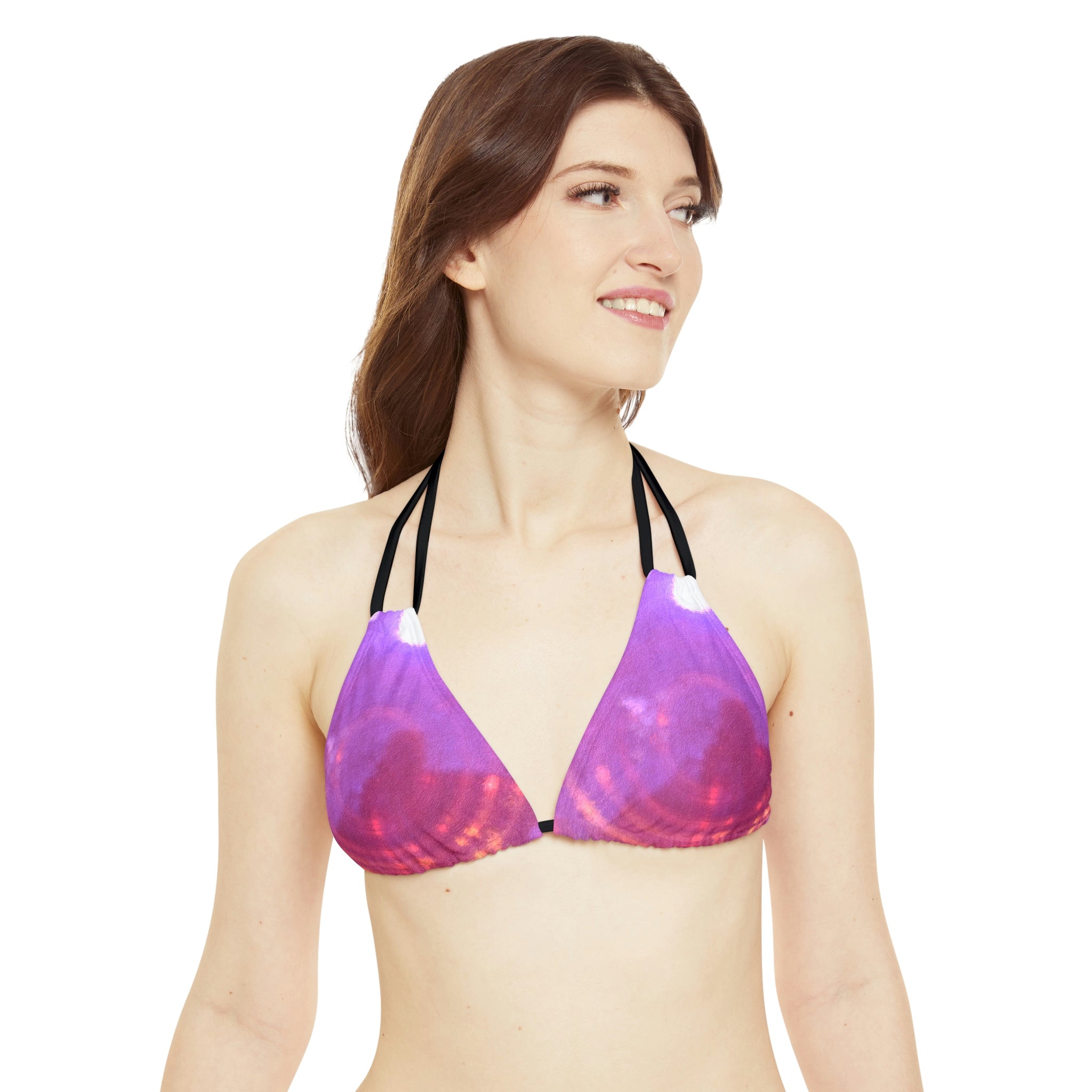 A stylish Pink Strappy Bikini Set featuring adjustable straps and removable cups, perfect for summer beach outings.