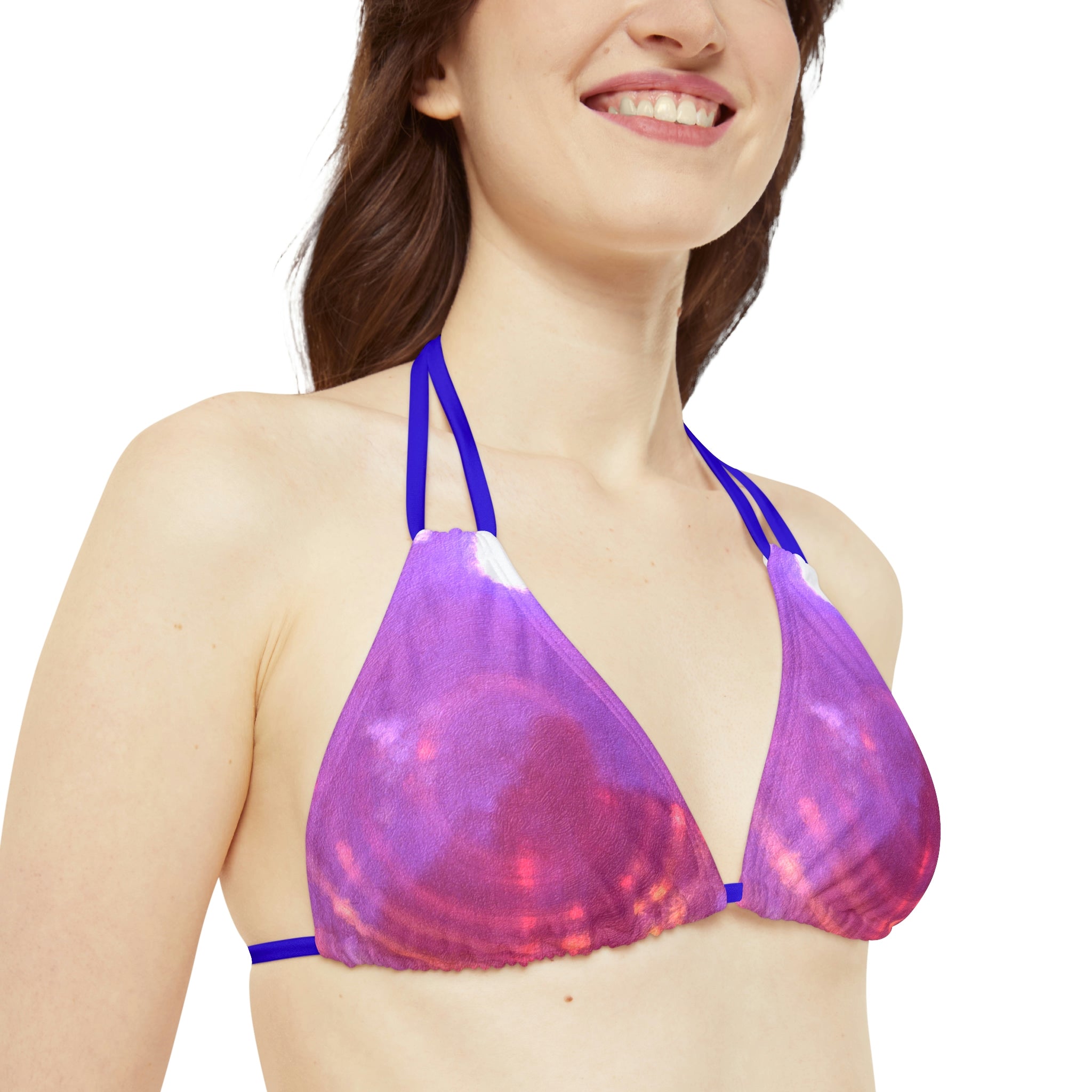 A stylish Pink Strappy Bikini Set featuring adjustable straps and removable cups, perfect for summer beach outings.