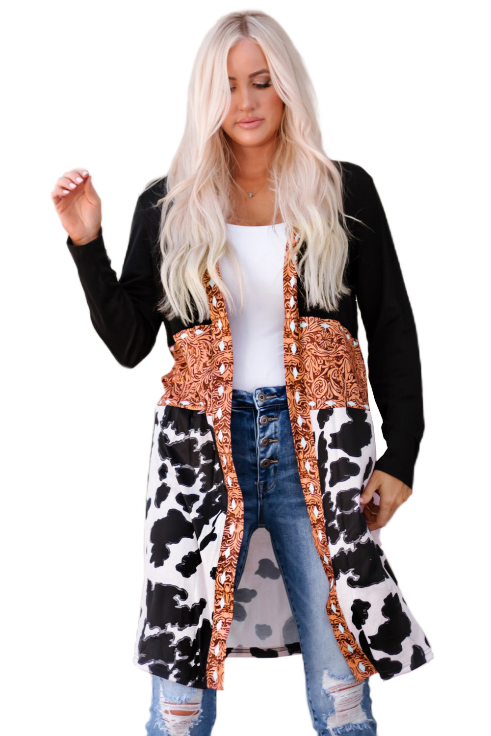 A stylish pink cardigan featuring a western cow patchwork design, open front style, perfect for casual wear.