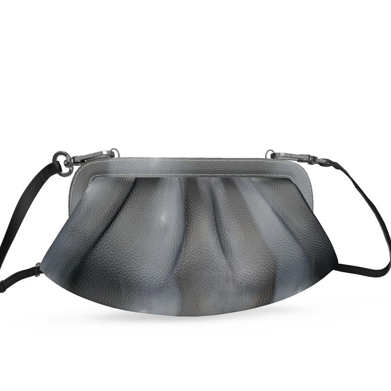 A stylish Pleated Soft Frame Bag made from real Nappa leather with a pleated design and detachable shoulder strap.