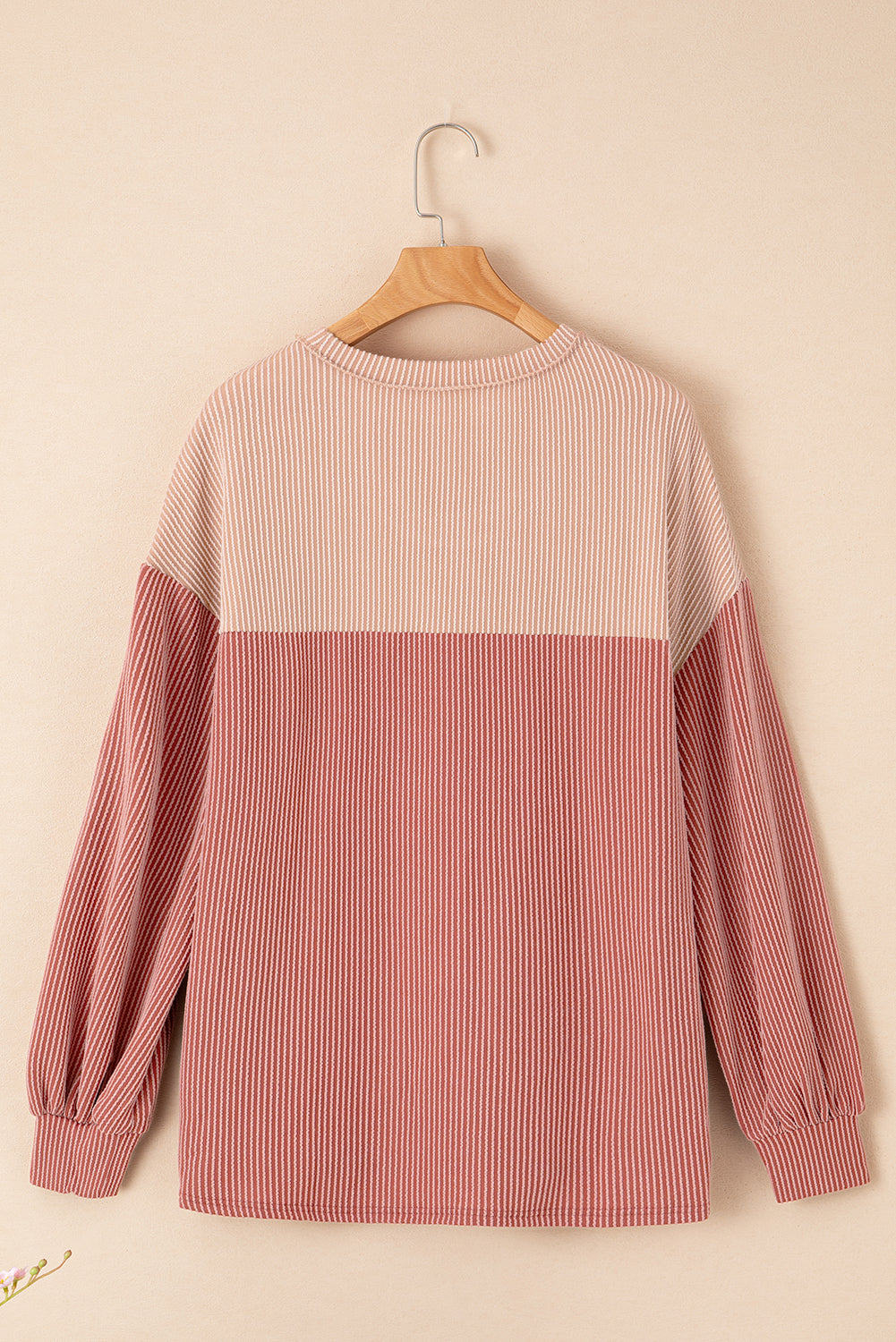 A stylish Printed Floral Contrast Colorblock Ribbed Top featuring vibrant floral patterns and ribbed fabric, perfect for casual or dressy occasions.